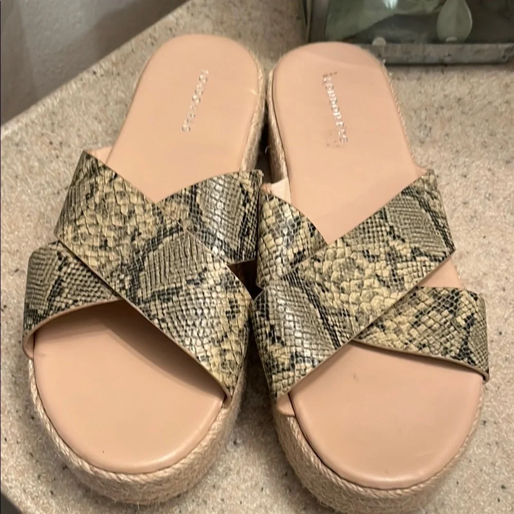 Cream and Black Sandals with Cross-Strap Design